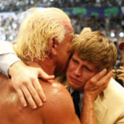 Both Ric Flair and Richard Fliehr are getting emotional as they are hugging in the pic.